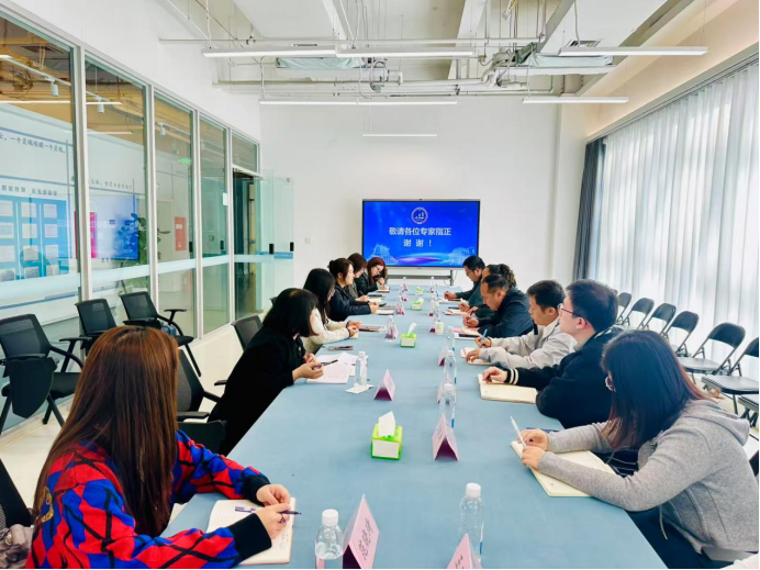 赴郑州西亚斯学院教育学院调研交流