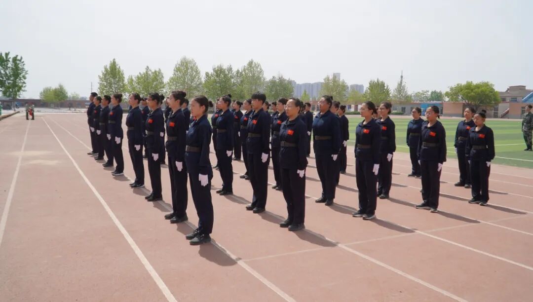 【国旗护卫队】米乐mile官方网站国旗护卫队举行第二十一届接旗暨授臂章仪式