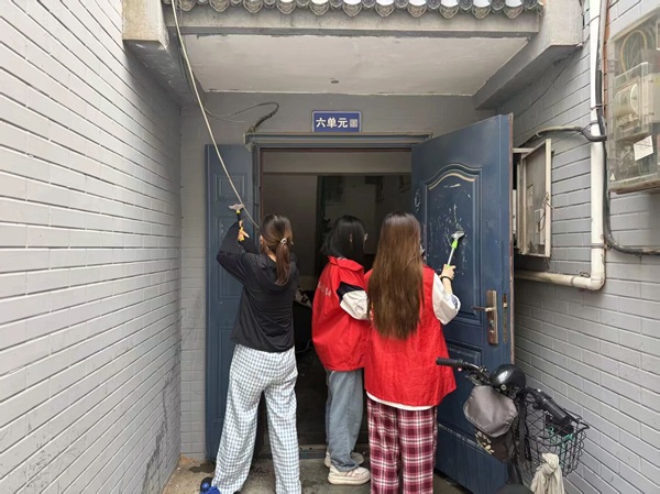 养成教育|米乐mile官方网站管理学院开展社区公益志愿服务